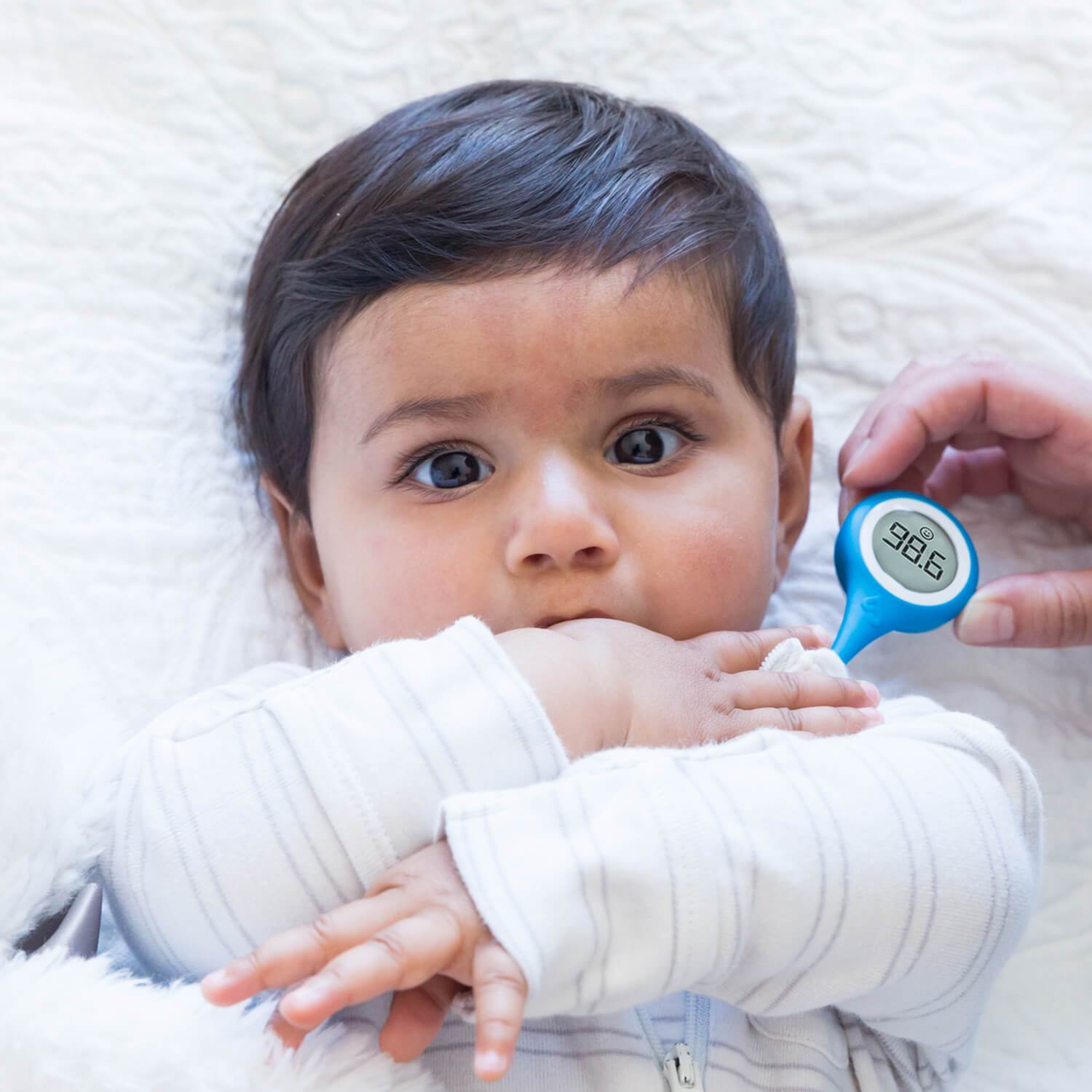 Kinsa Smart Ear digital thermometer in use
