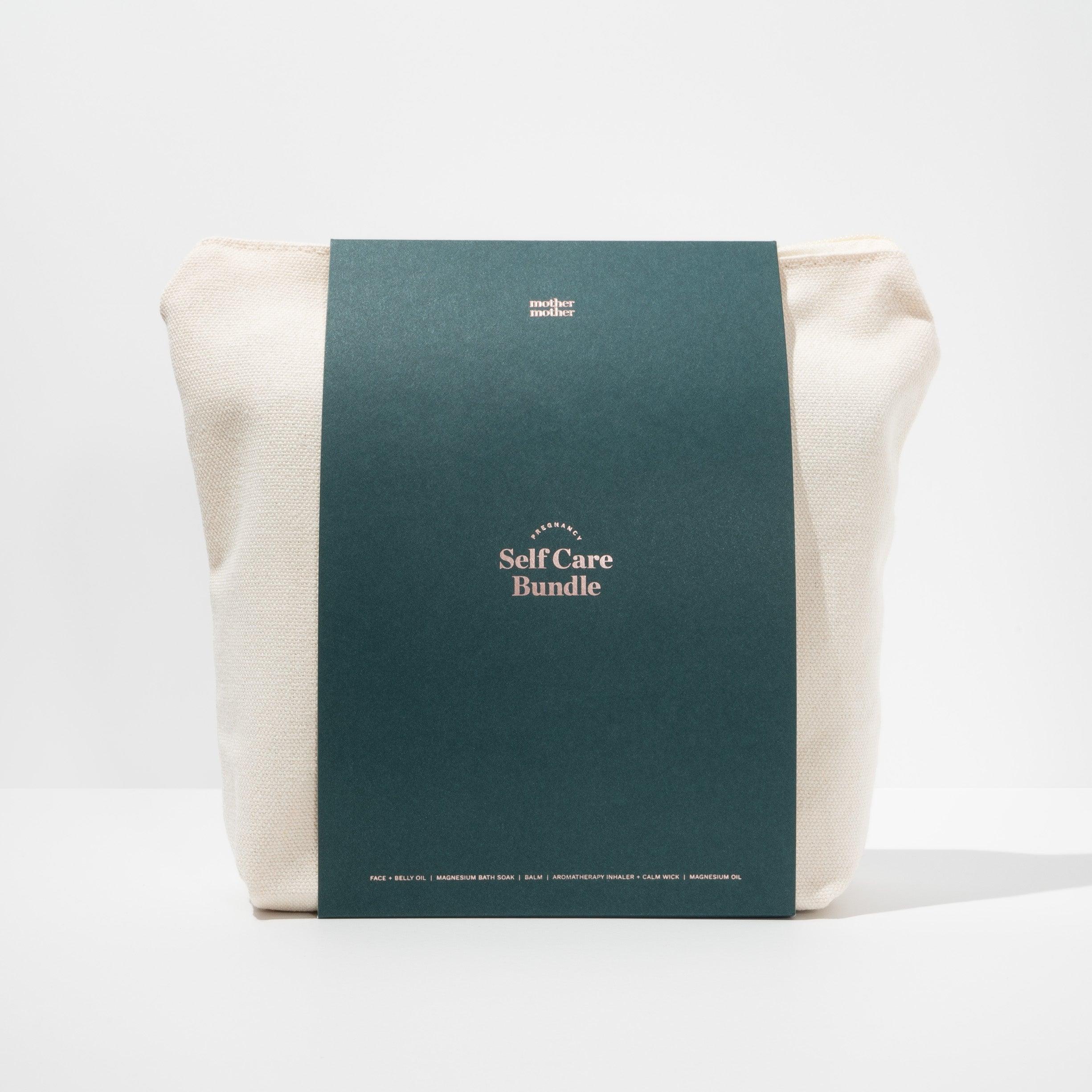 pregnancy and postpartum self care bundle in canvas bag on a white background