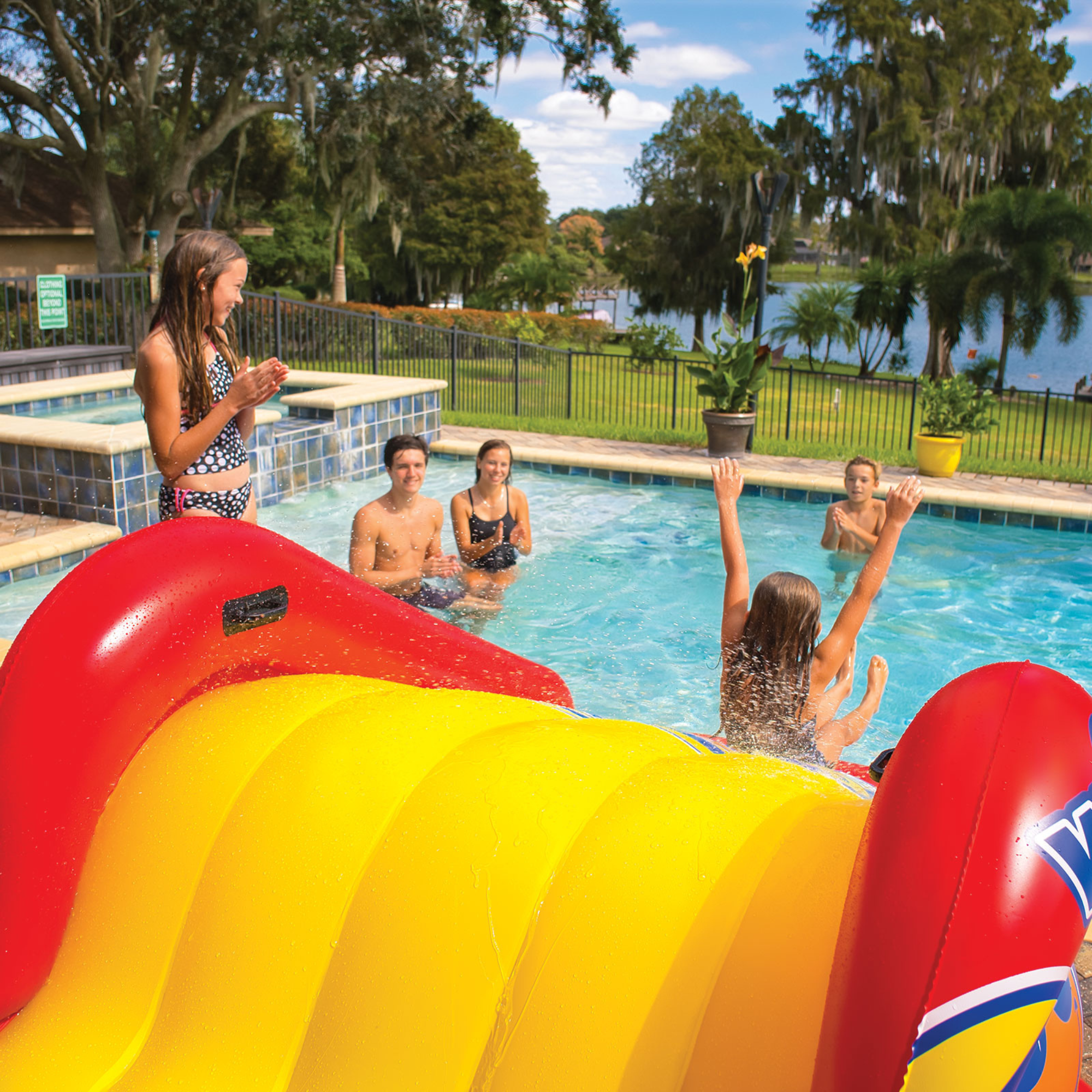 WOW Sports Slide N Smile Inflatable Pool Slide with Sprinklers for Kids and Adults by Jupiter Gear