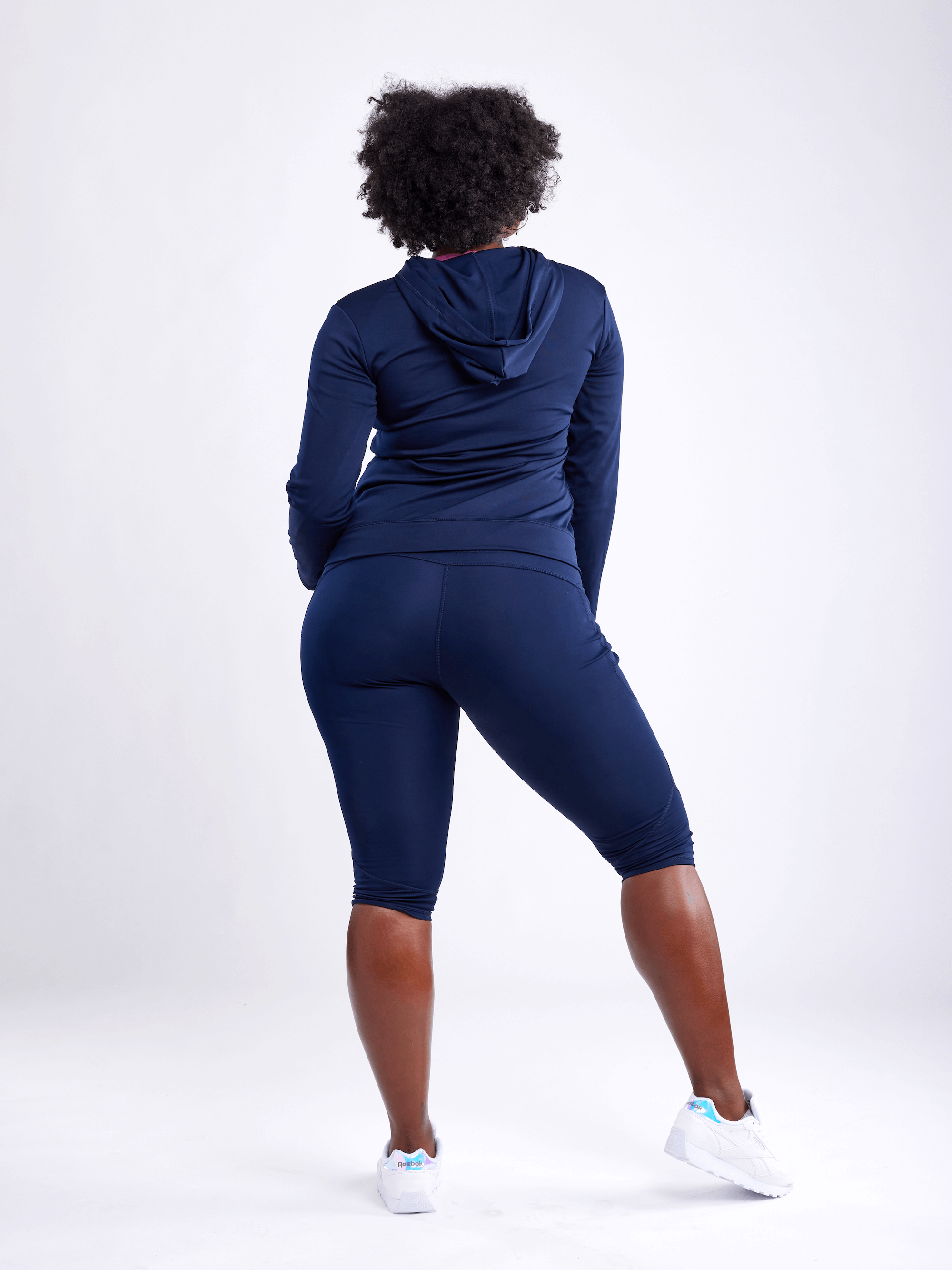 JupiterGear Mid-Rise Capri Fitness Leggings with Side Pockets by Jupiter Gear