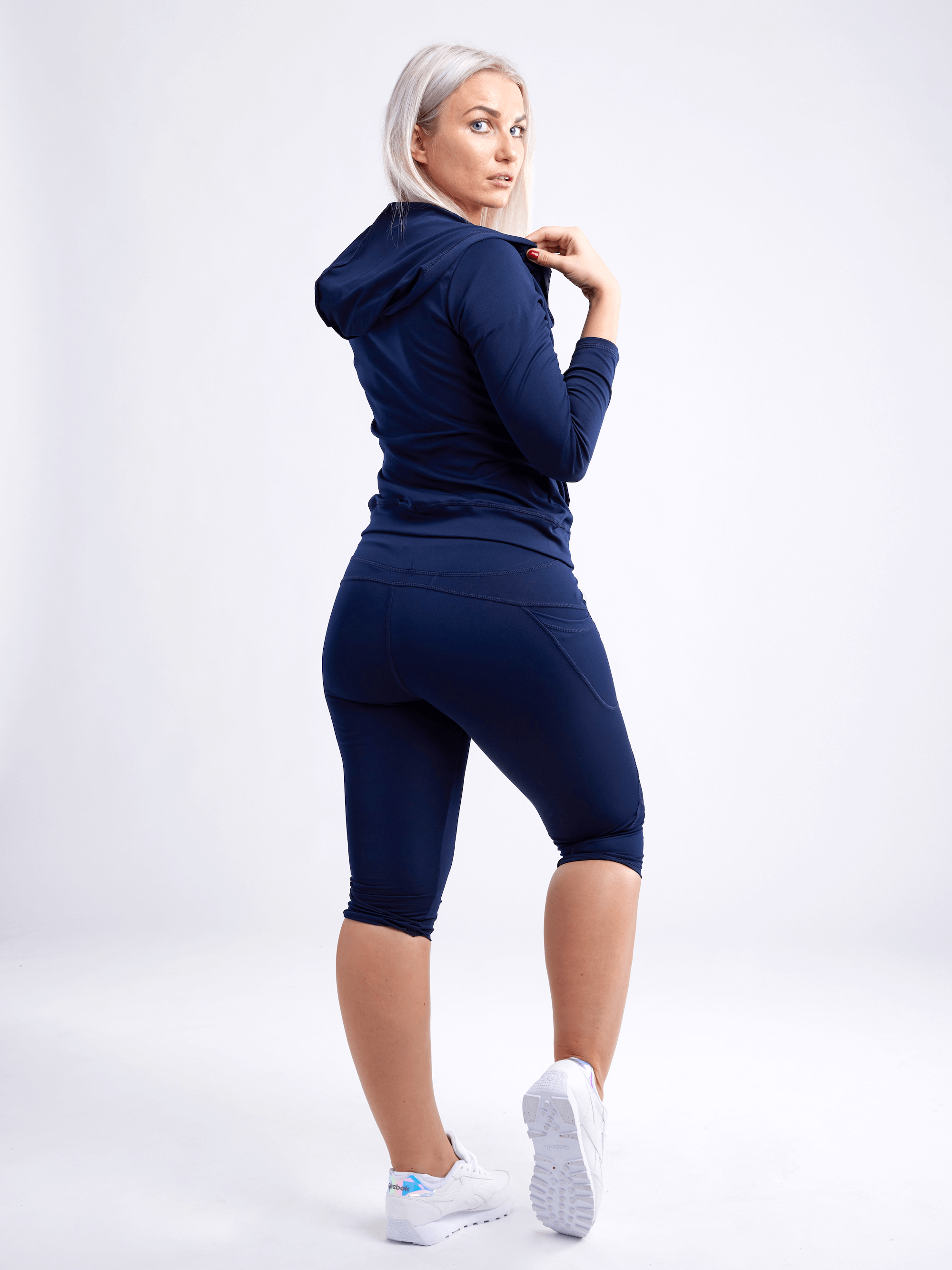 JupiterGear Mid-Rise Capri Fitness Leggings with Side Pockets by Jupiter Gear