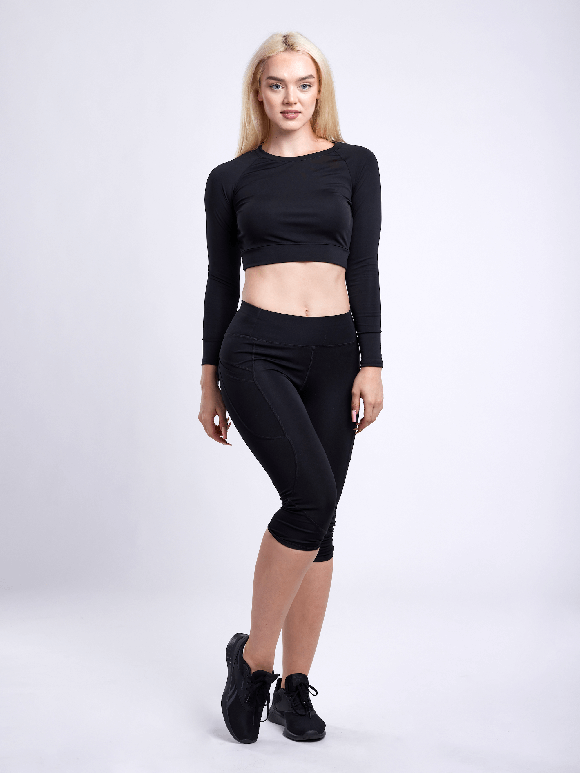 JupiterGear Mid-Rise Capri Fitness Leggings with Side Pockets by Jupiter Gear
